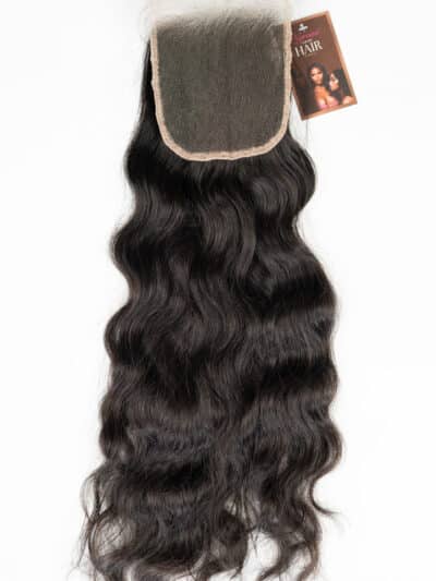 Natural black raw Indian wavy lace closure on a plain white background